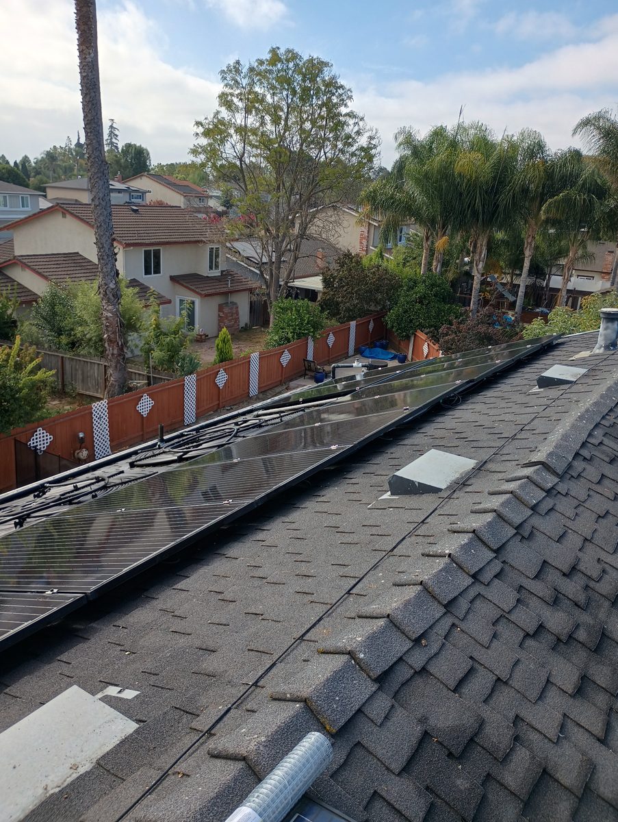 Solar panels on a shingle roof