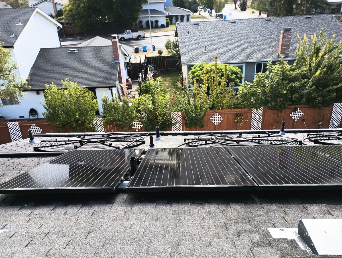 Solar panels with pool heating on roof